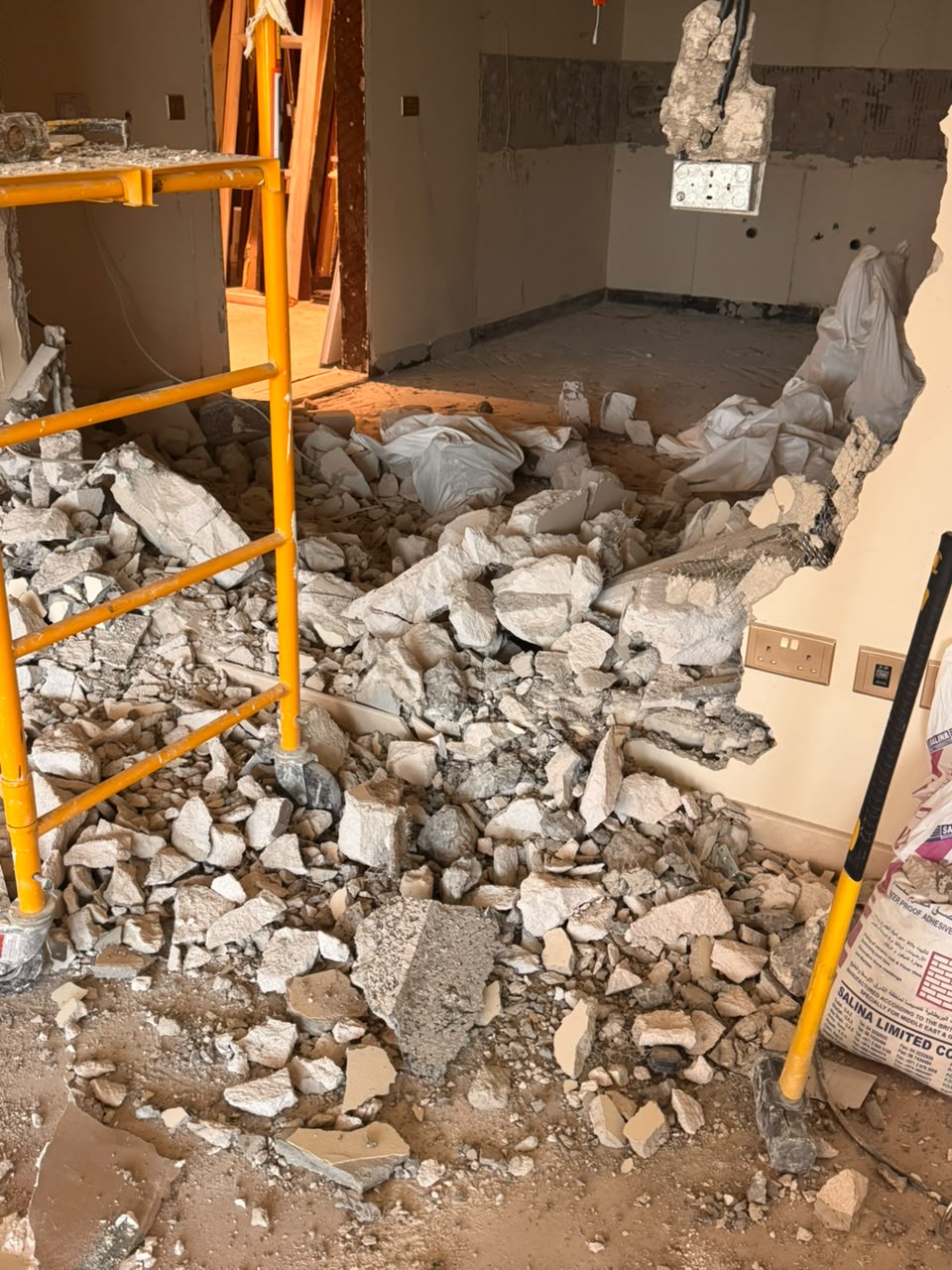 Demolition rubble in a villa room ready for removal